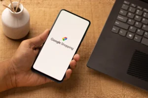 Google Shopping logo on phone screen