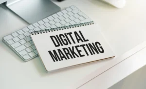 Notebook with Tools and Notes about Digital Marketing, concept