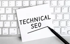 White paper with text Technical Seo lying on the keyboard